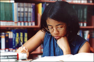 Young girl studying.